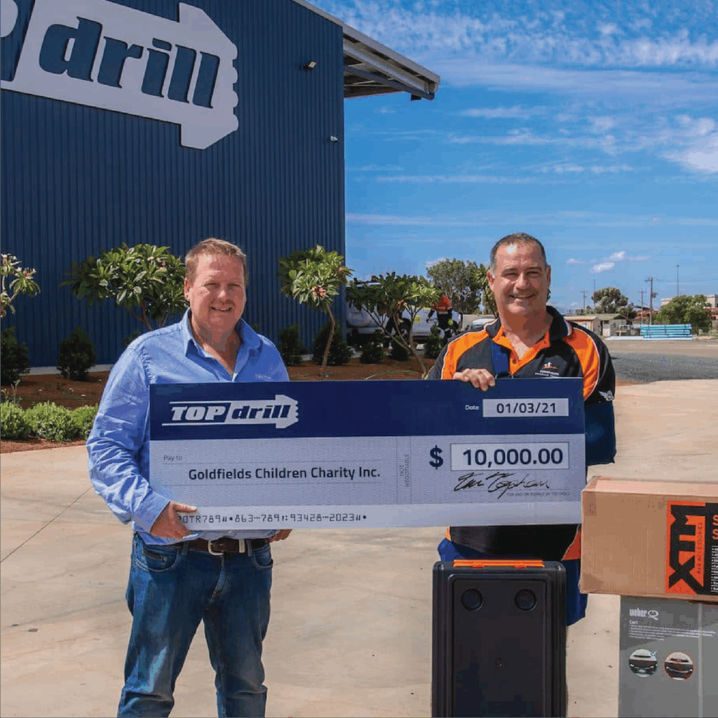 Topdrill donating money to the Goldfields Children's Charity